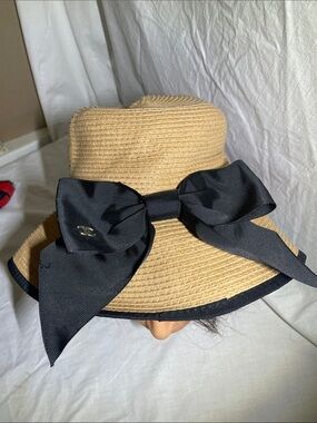 Wide-Brim Straw Hat with Black Bow Accent